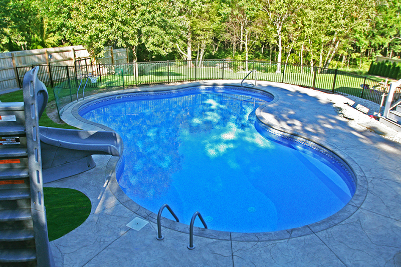 Swimming pool and stamped concrete project example 216